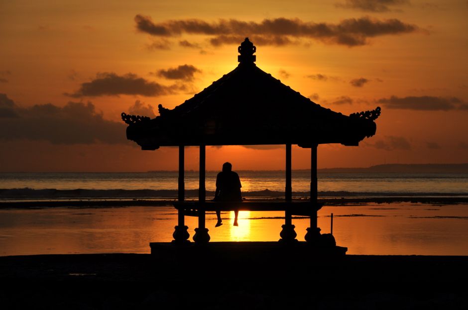 Relax on the pristine beaches of Nusa Dua and Seminyak
